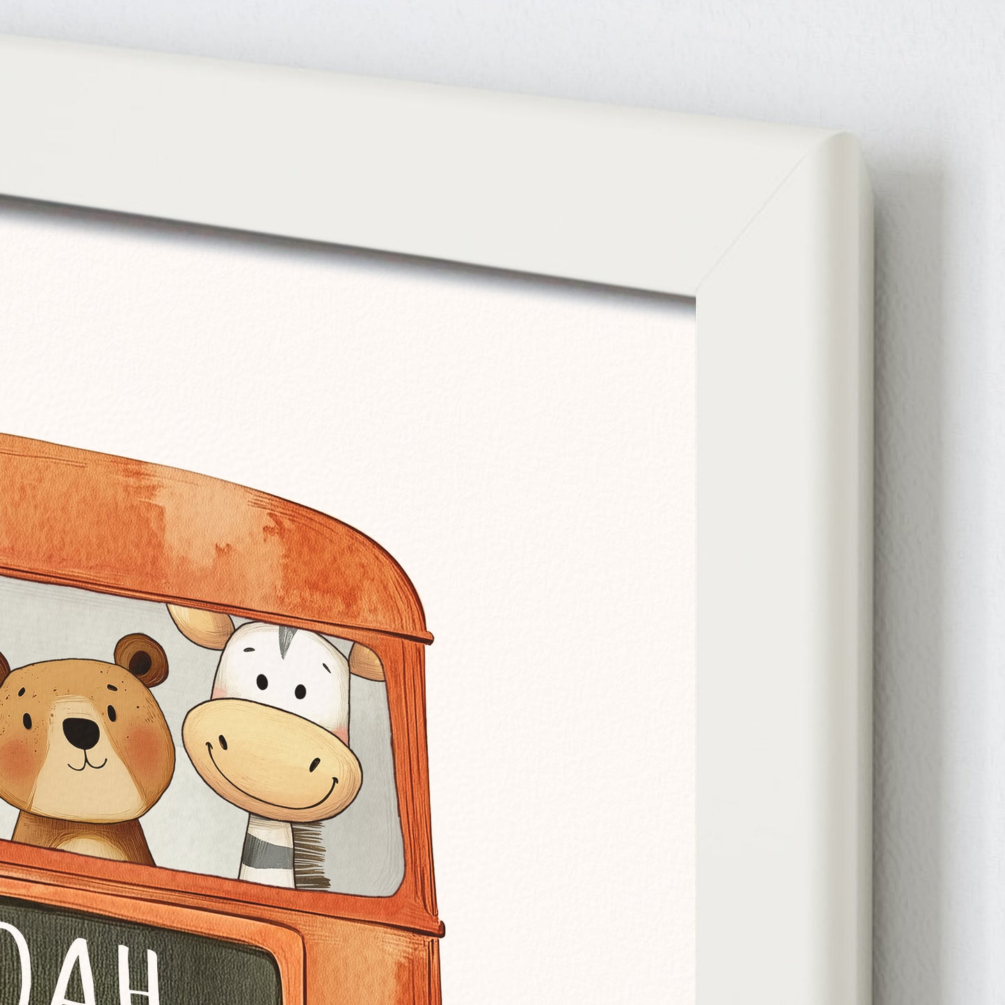 Close up detail of personalised framed children's name print of a London bus