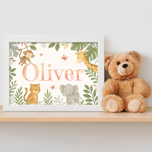 Personalised framed children's name print with animal illustrations in a jungle safari theme next to a teddy bear on a shelf.