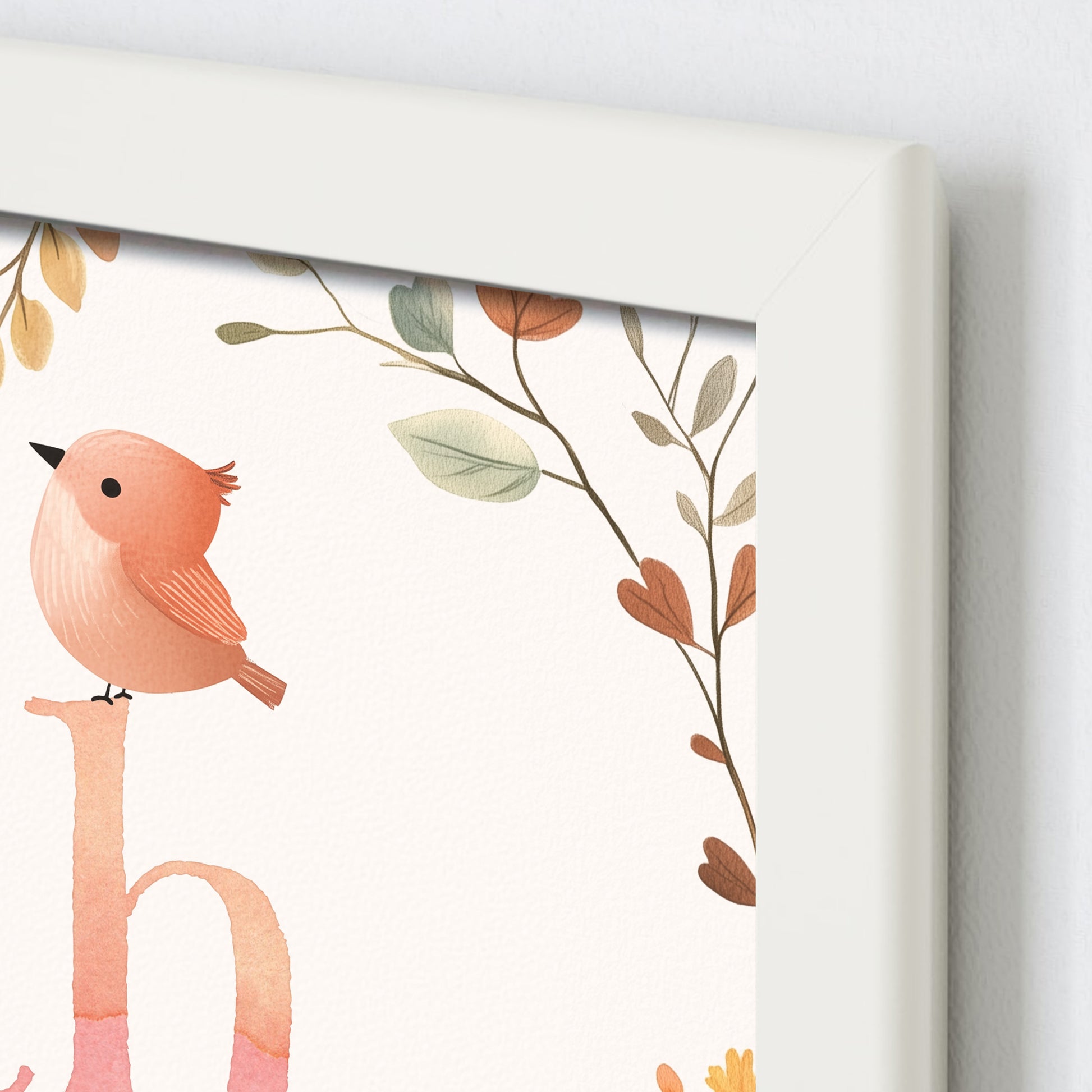 Close up detail of personalised framed children's name print with nature illustrations with birds and butterflies in a woodland theme